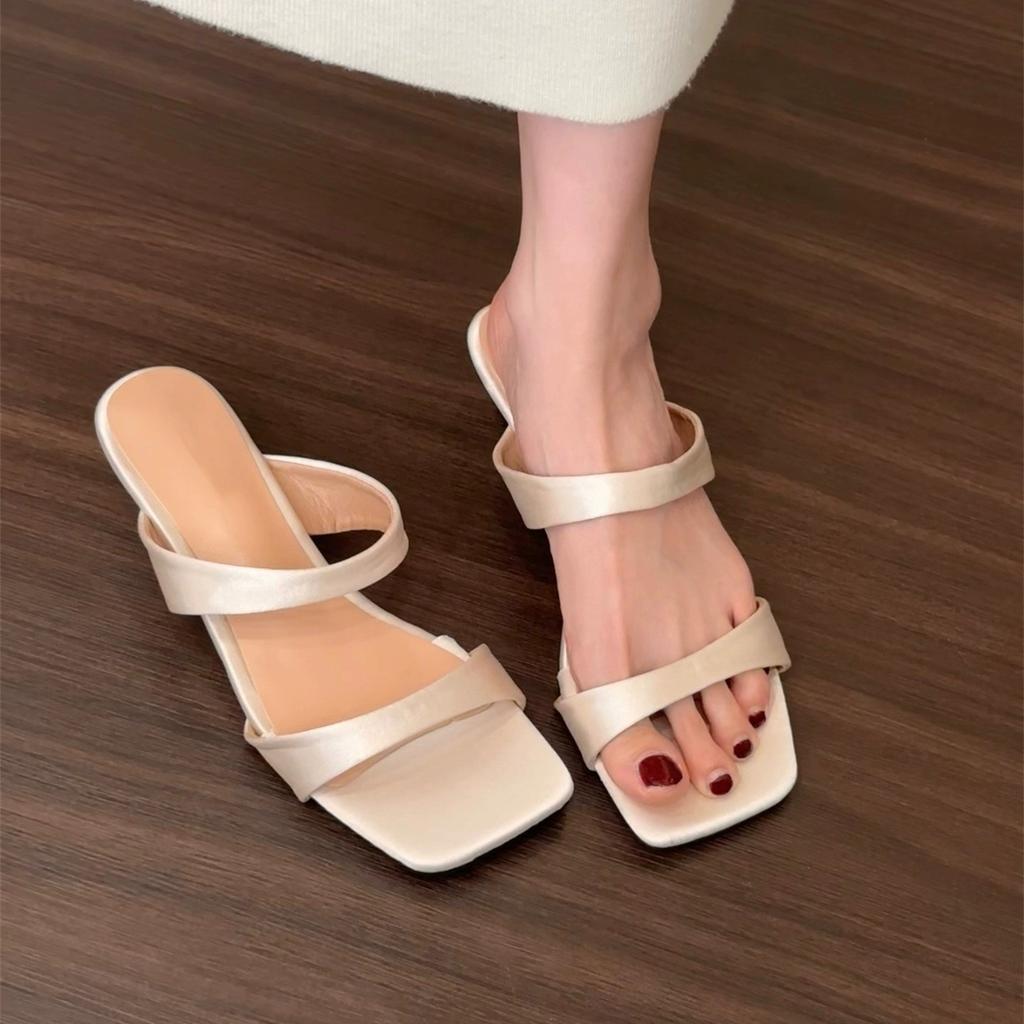 Slope heel simple and versatile one-word slippers women's shoes wear 2025 new summer skirt French sandals