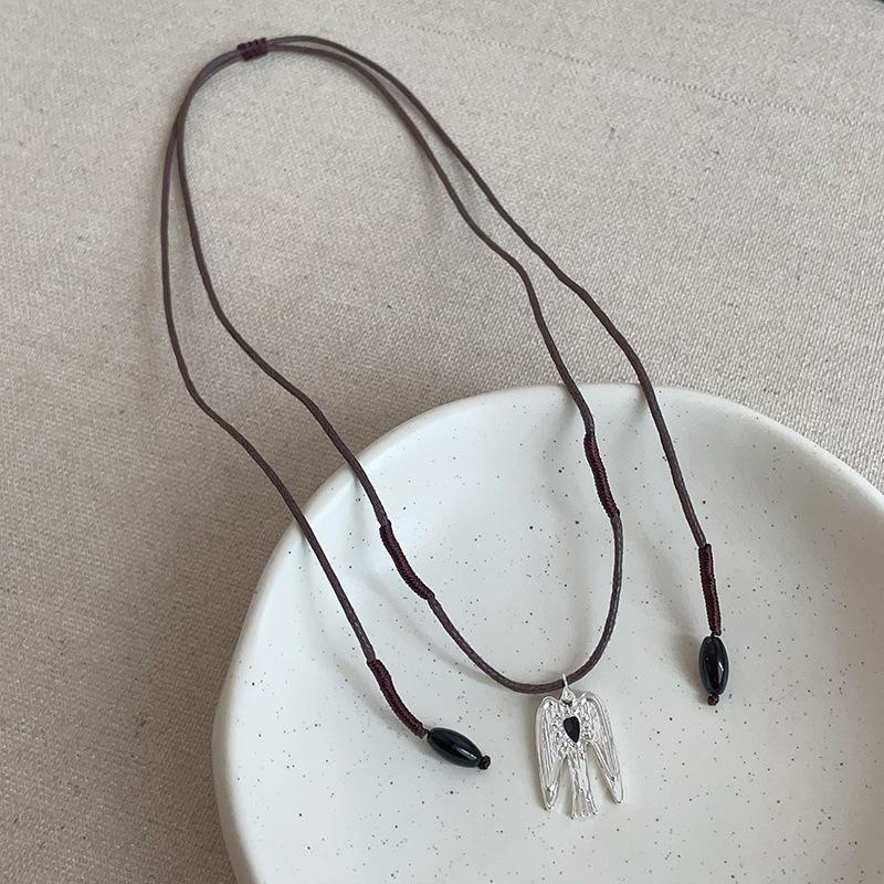 

2026 New Arrival Long Adjustable Wax Rope Sweater Chain Chokers For Women Metallic Bird With Wings Pendant Necklaces