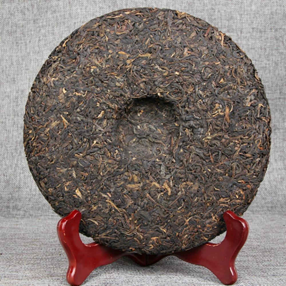 

Yunnan Pu erh Raw Tea Cake 400g Natural Big Leaf Green Pu-erh Health Care