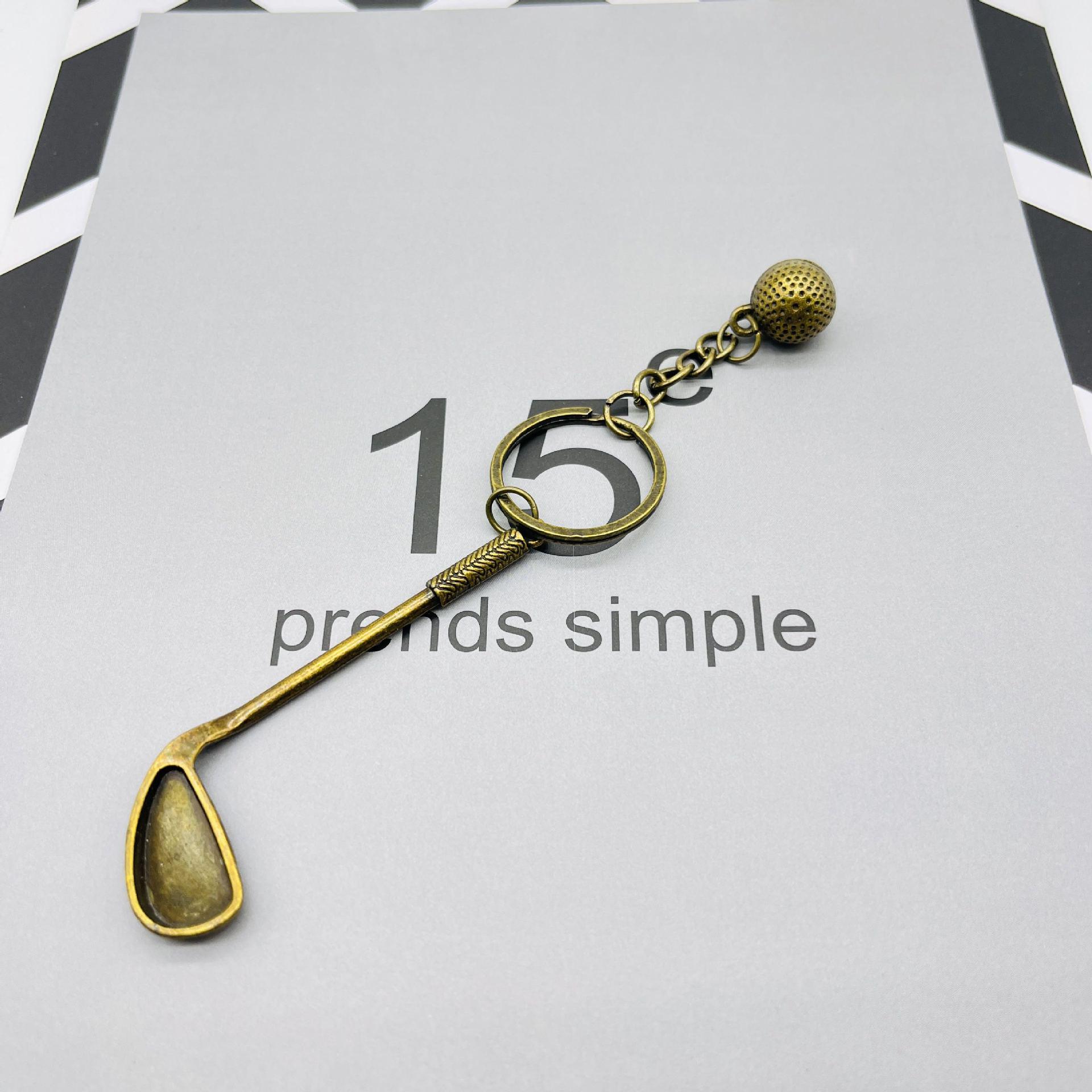 

Цельнометаллический брелок-подвеска в виде мяча для гольфа - миниатюрный аксессуар в спортивной тематике 7.8CM