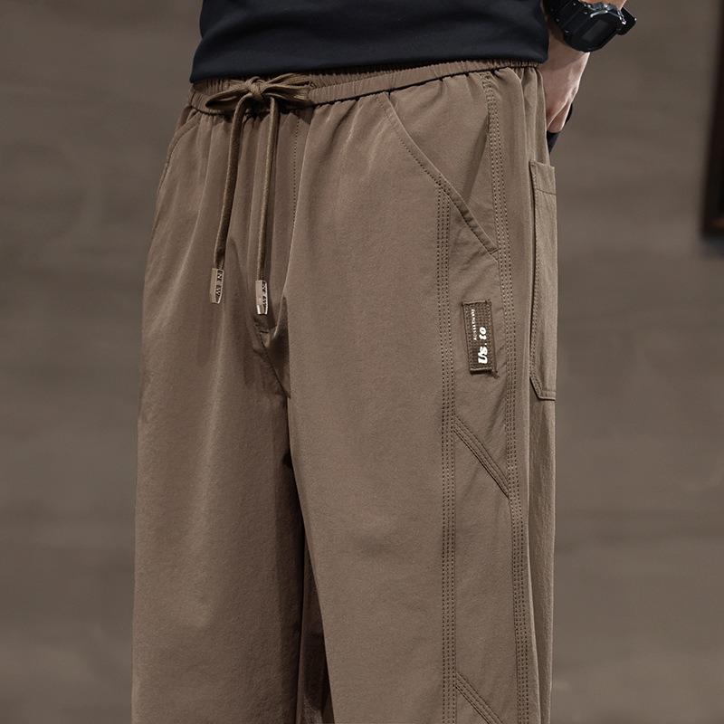 New Men's Spring Tooling Pants Men's Slim Straight Versatile Thin Casual Pants Breathable Foot Tie Trend Brand