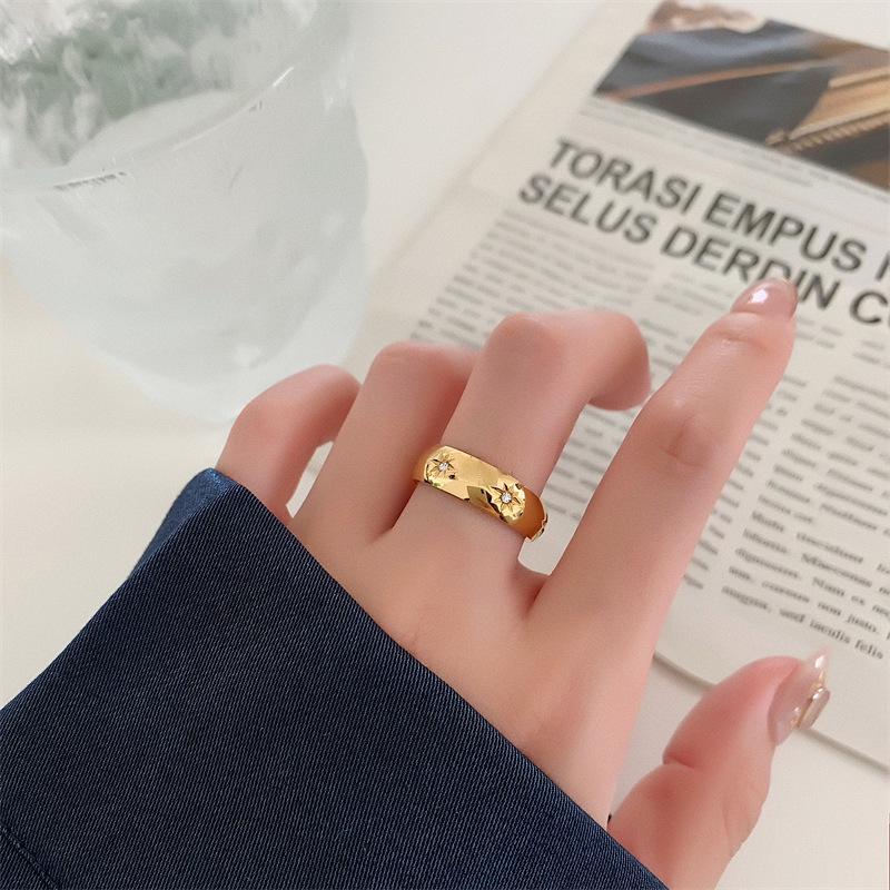 Gold-Plated Titanium Steel Ring with Diamonds and Eight-Pointed Star Design