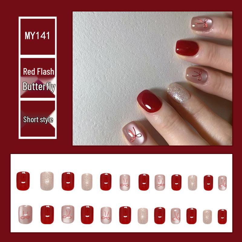 

Crushed Glitter Cat Eye Bow Nails - Red Short Versatile Nail Art for Holiday Atmosphere