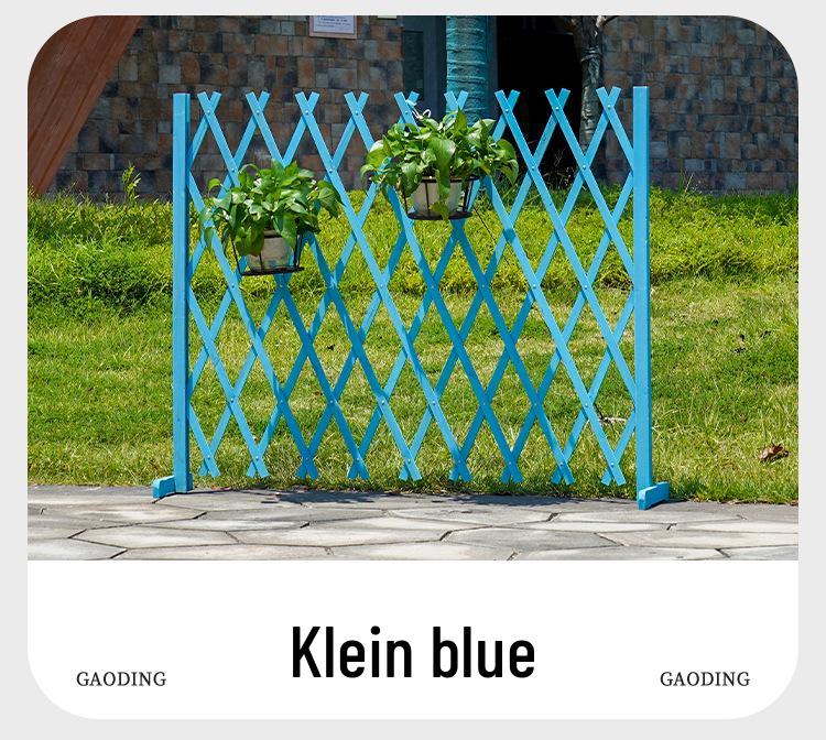 Zatahovací venkovní plot pro domácí mazlíčky a zahradu z masivního dřeva s antikorozním ochranným zábradlím a stojanem na květiny