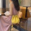 2026 New Drawstring Bucket Bag for Women Soft Leather Crossbody Bag with Ball Charm Mini Shoulder Handbag for Daily Shopping