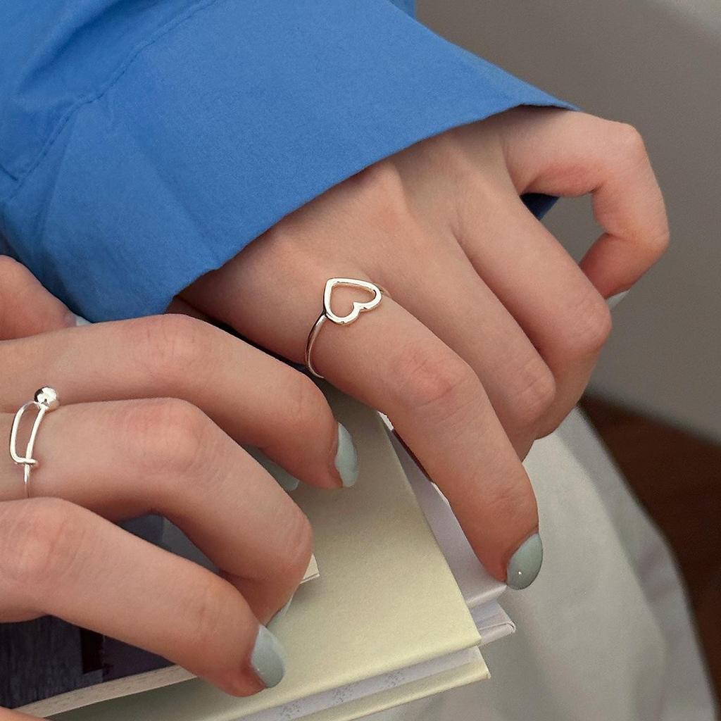Elegant Geometric Push-Pull Hollow Heart Ring for Women - Trendy Fashionable Index Finger Style
