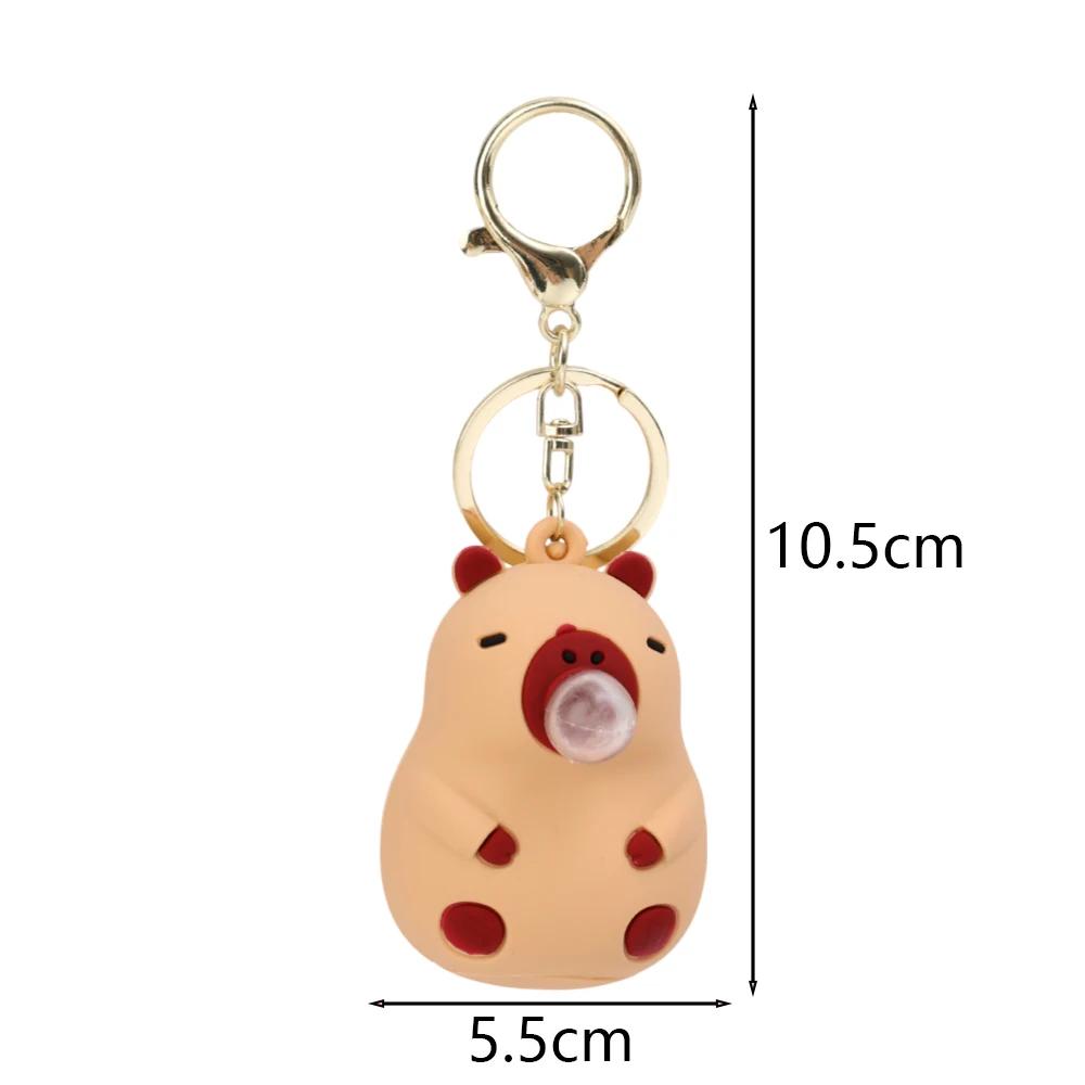 Kapibara Ściśnij Zabawka Muzyczna Nadmuchująca Bańki Breloczek Lalka Kapibara dla Dziewczynek Zabawki Anty-stresowe Zawieszka do Plecaka Dziecięcego