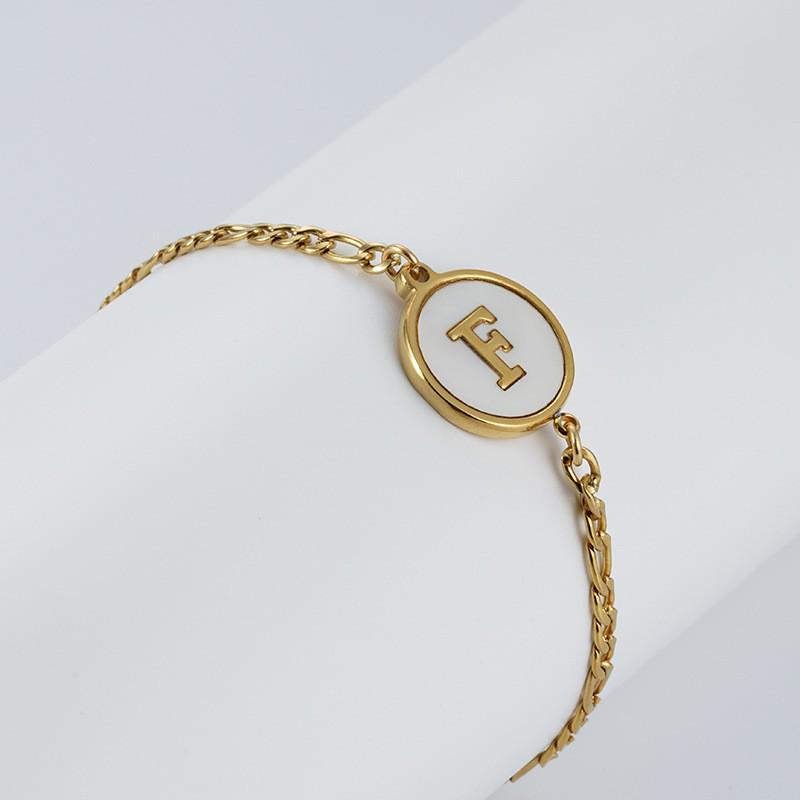 Pulsera Redonda de Acero Inoxidable 18K Europea con Letra para Mujer - Joyería de Mano Moderna y Elegante