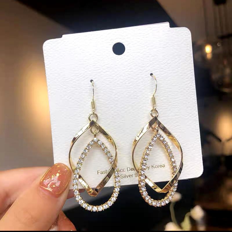Fashion Geometric Bow Flower Pearl Earrings Women'S Premium Versatile Small Fragrant Wind Earrings