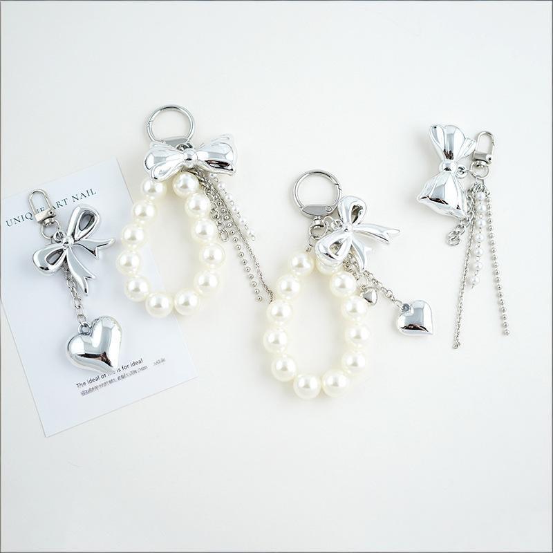Fashionable Bow Key Pendant with Durable Design for Versatile Use As Keychain or Bag Accessory