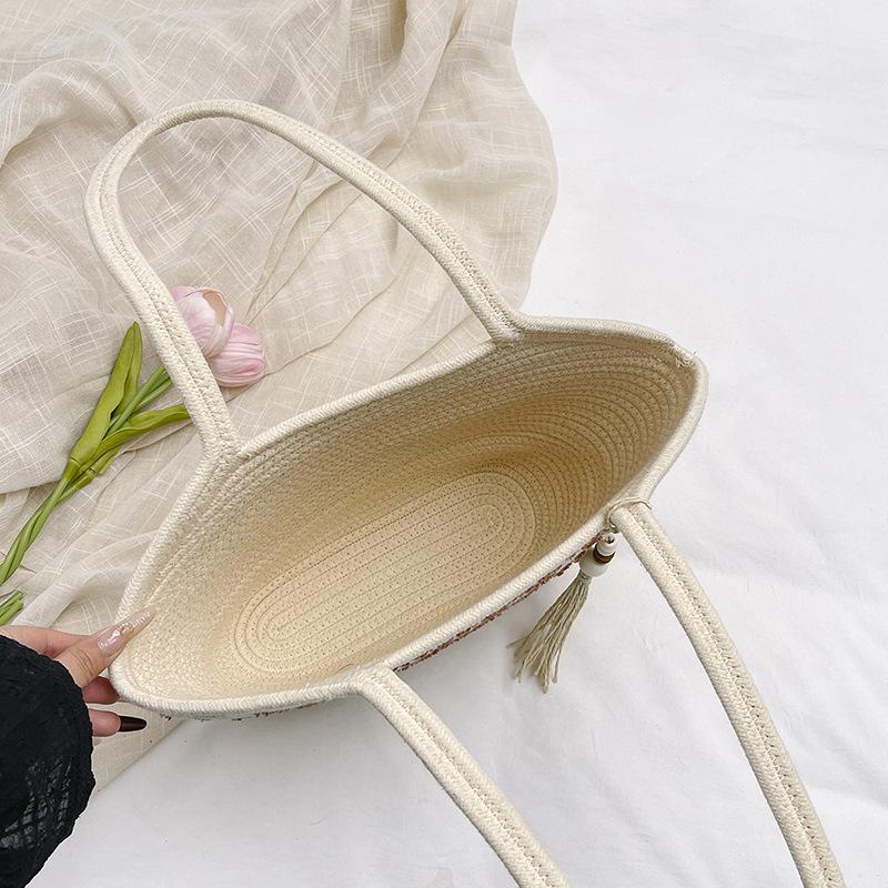 2025 summer new temperament literary large-capacity woven bag multi-functional foreign style portable underarm beach bag