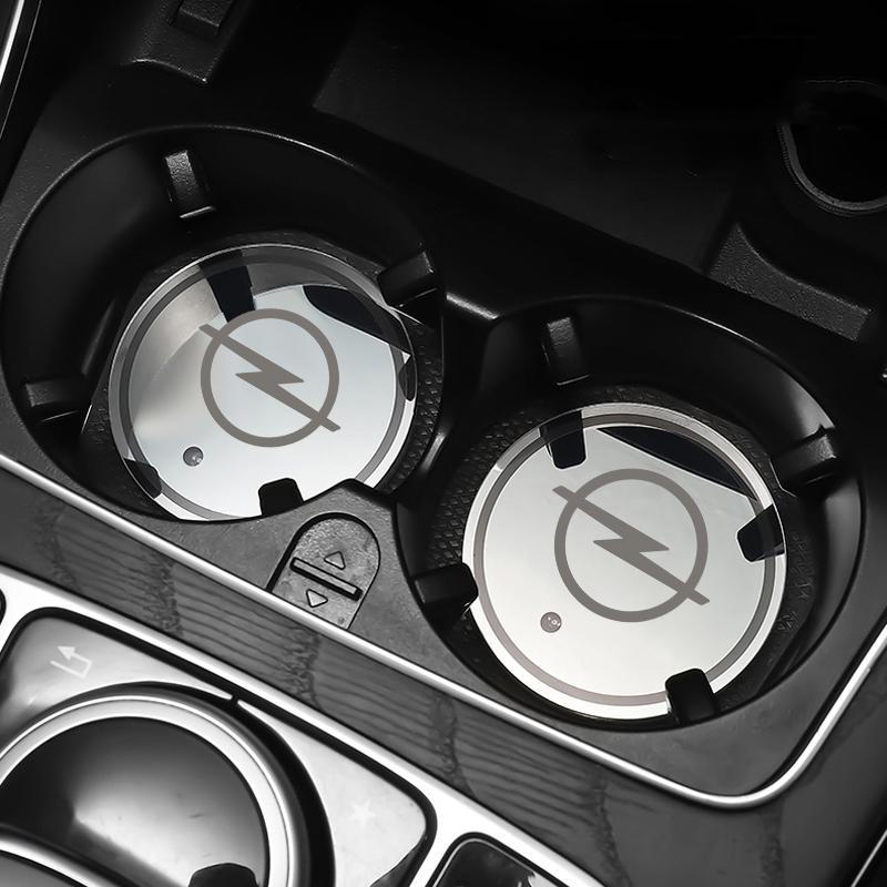 AAAYN1 1/2Pcs Luminous Car Coaster Water Cup Holder Non Slip Pads Mats For Opel Astra Insignia Mokka Zafira Corsa G J Car Wheel Hubcap