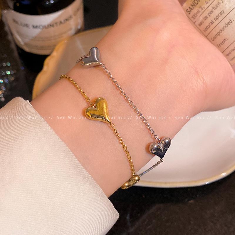 Korean sweet temperament love titanium steel bracelet women's light luxury niche fashion peach heart jewelry