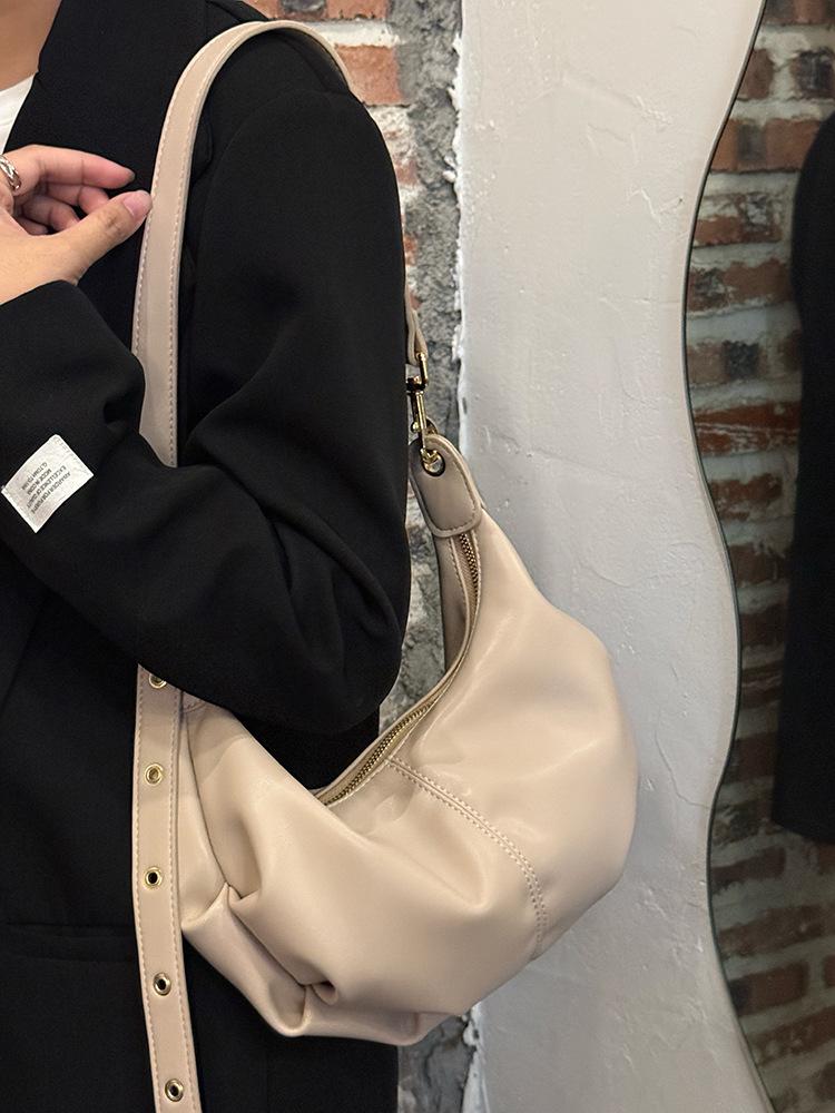 Soft leather large capacity dumpling bag women's 2025 new retro high-end niche commuter shoulder messenger bag