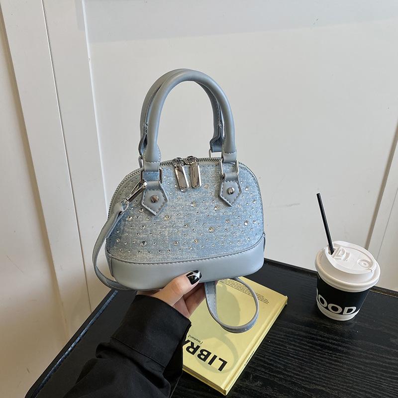 New niche design high-end versatile rivets portable fashionable single shoulder oblique span shell bag