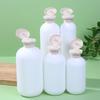 Refillable Plastic Travel Bottles – Squeeze and Pump Containers with Flip Cap for Shampoo, Lotion, Cream, and Shower Gel
