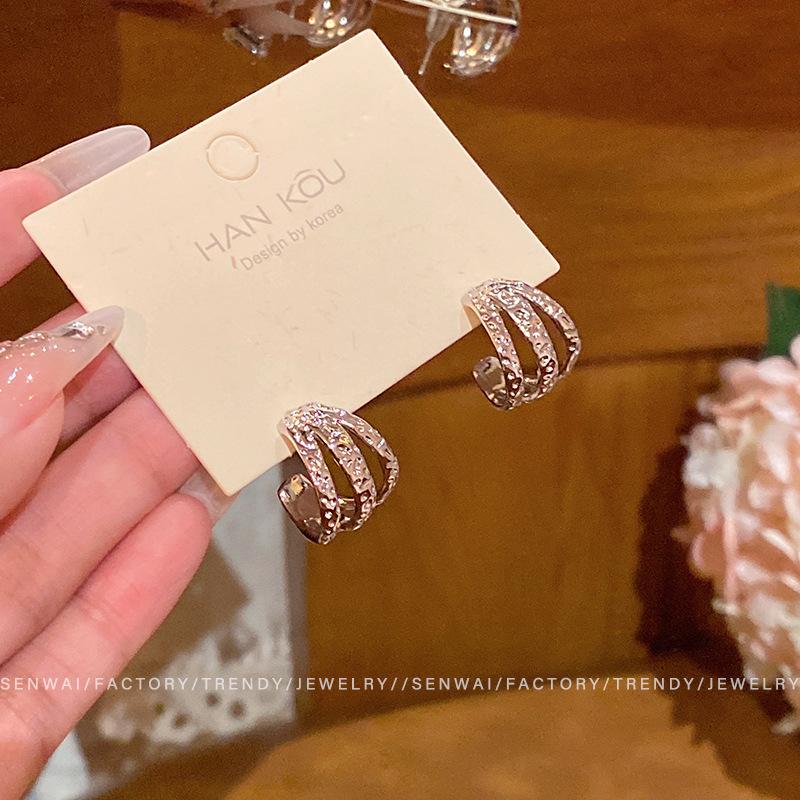 

Cold wind silver C-shaped stud earrings women s earrings retro temperament earrings