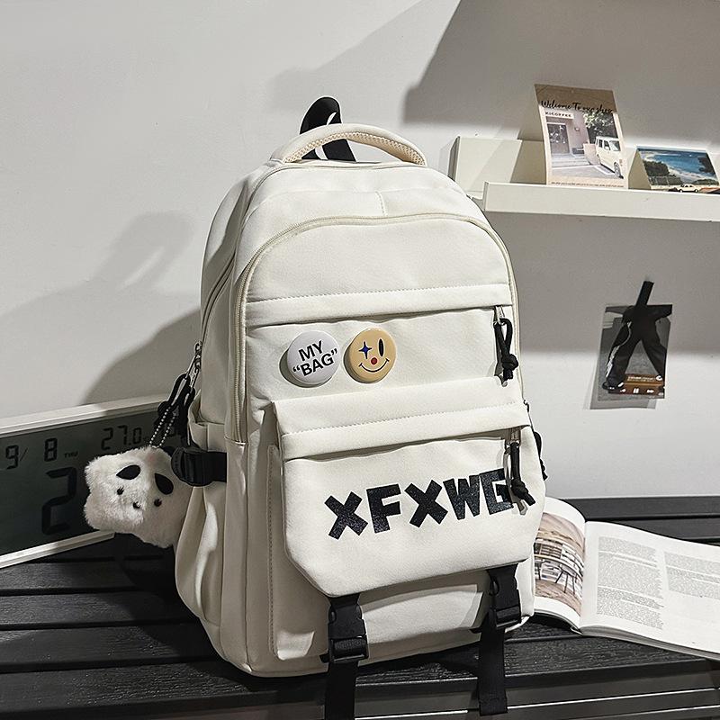 Korean ins style high appearance Harajuku trendy couple backpack junior high and high school students light and large capacity schoolbag girl
