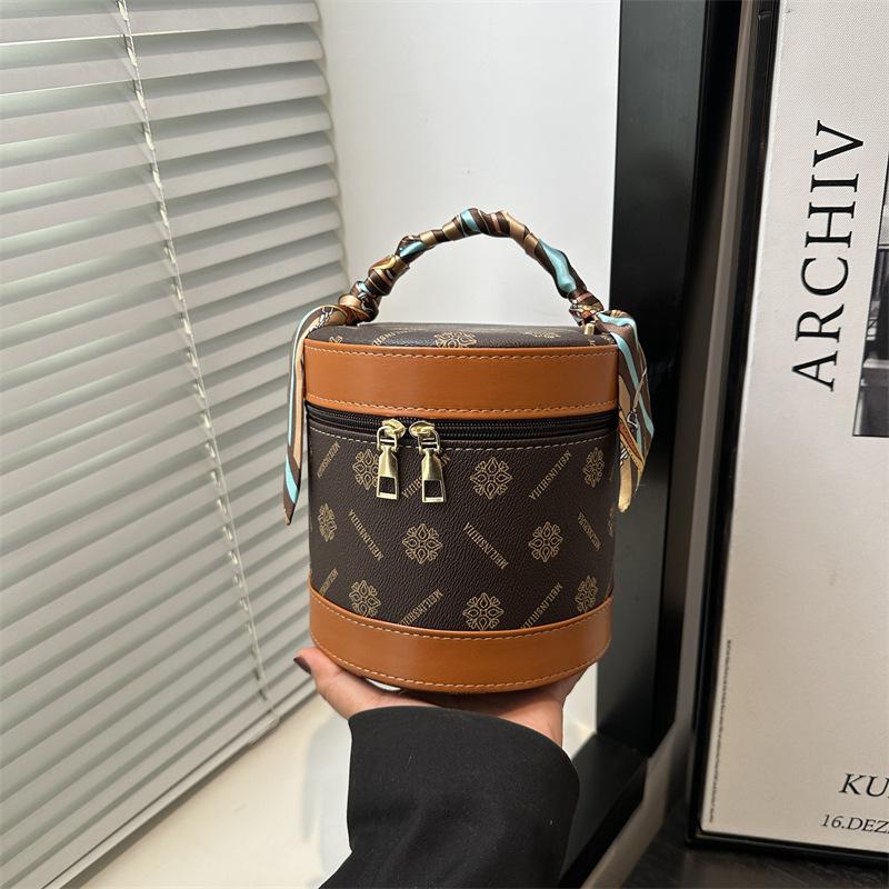 Beliebte Tasche Damen 2025 neue Mode tragbar ausgehen zur Arbeit beliebte kleine Zylindertasche Kosmetiktasche