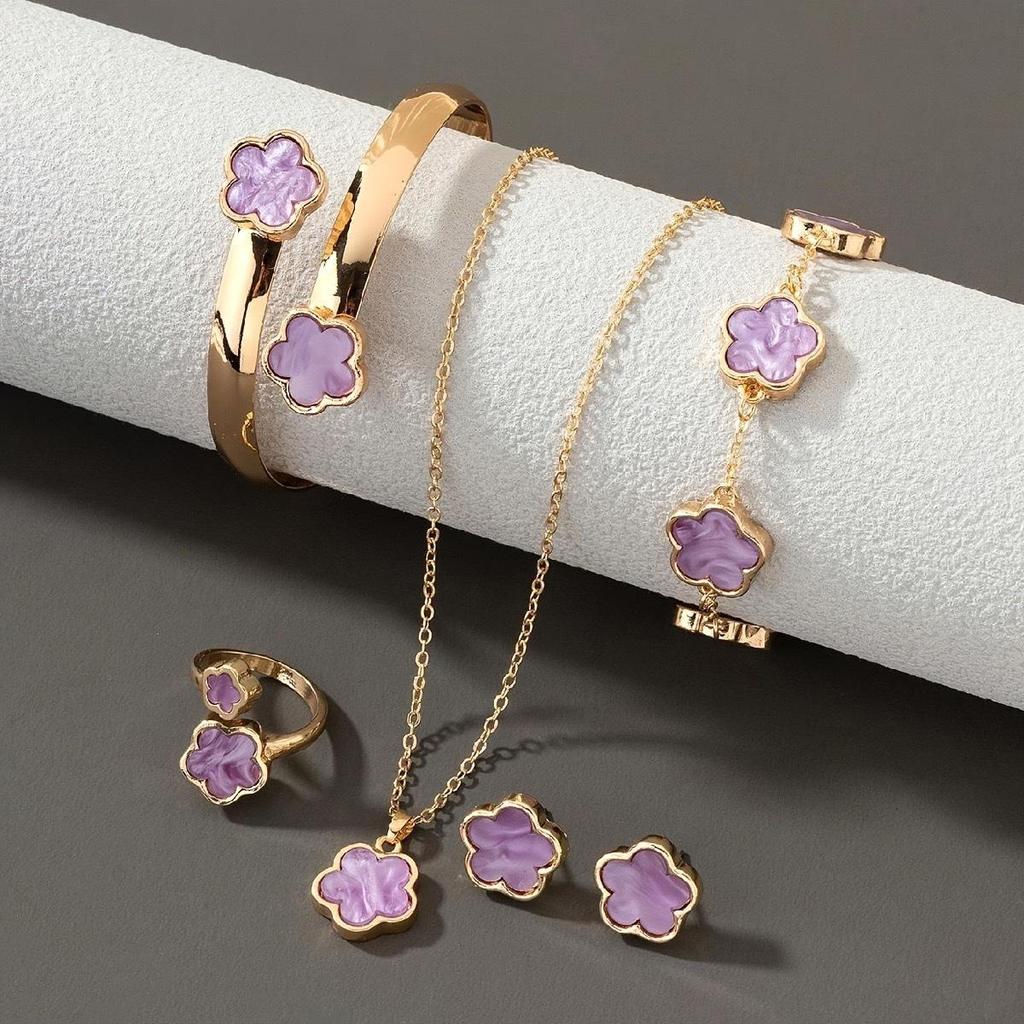 Elegant 5-Piece Flower Jewelry Set: Necklace, Bracelet, Earrings, and Ring.