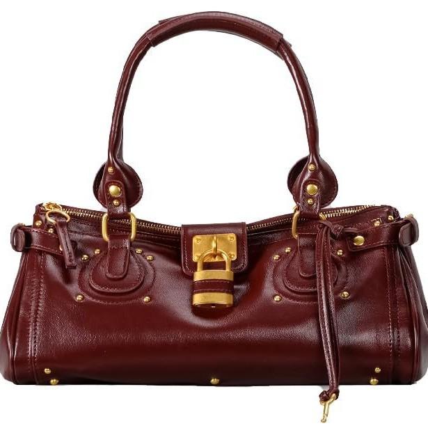 Herbst und Winter Retro Nietenverschluss Kopf Achseltasche Umhängetasche Schultertasche Damen