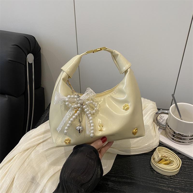 Super fire small bag women 2025 new foreign versatile messenger bag popular this year Korean women's dumpling bag