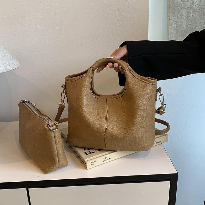 Retro work commuter bag women's large-capacity new casual versatile messenger bag women's hand-held child and mother bag