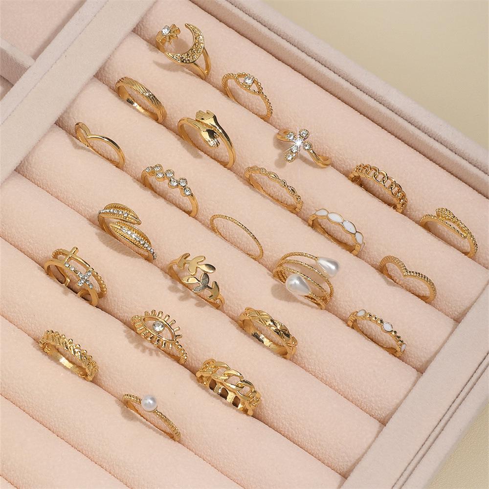 23-teiliges Mehrgelenk-Ring-Set: Tropföl, Eingelegter Diamant, Perle, Sonne & Mond Designs