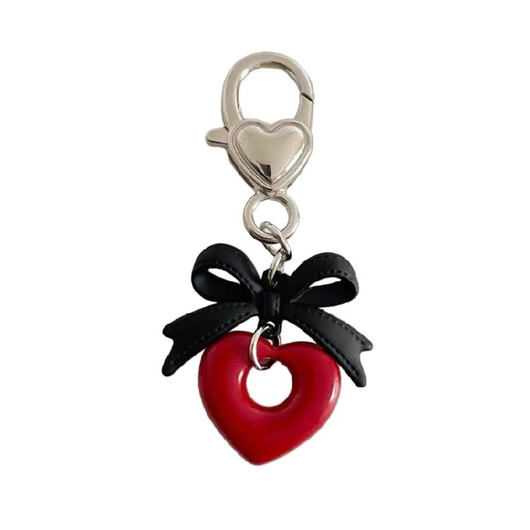

Stylish Black Bowknot Heart Charm Trendy Keychain Charm for Fashion Enthusiasts 1