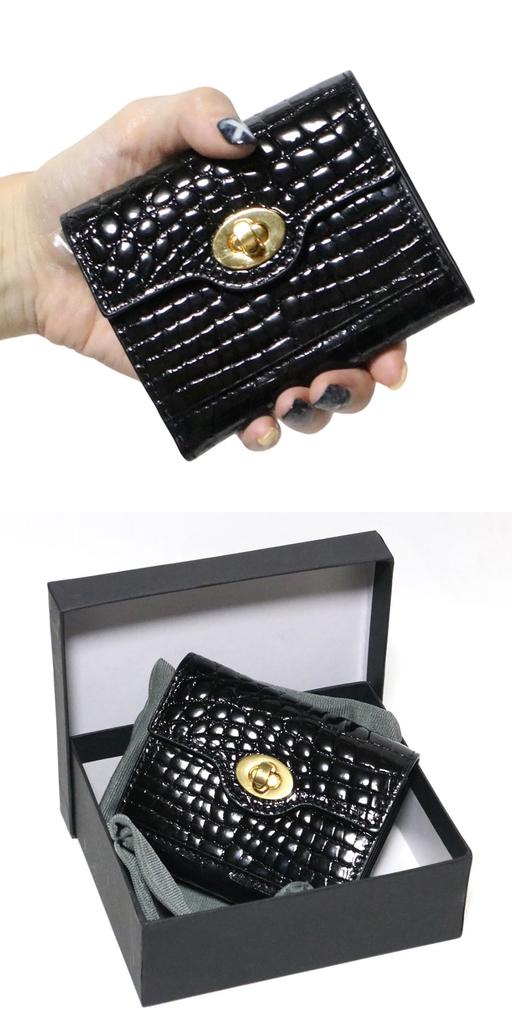 This Black Long Wallet for Men and Women Is Made from a Single Piece of Genuine Leather, Featuring a Round Zipper, Coin Purse, and Card Slots. It