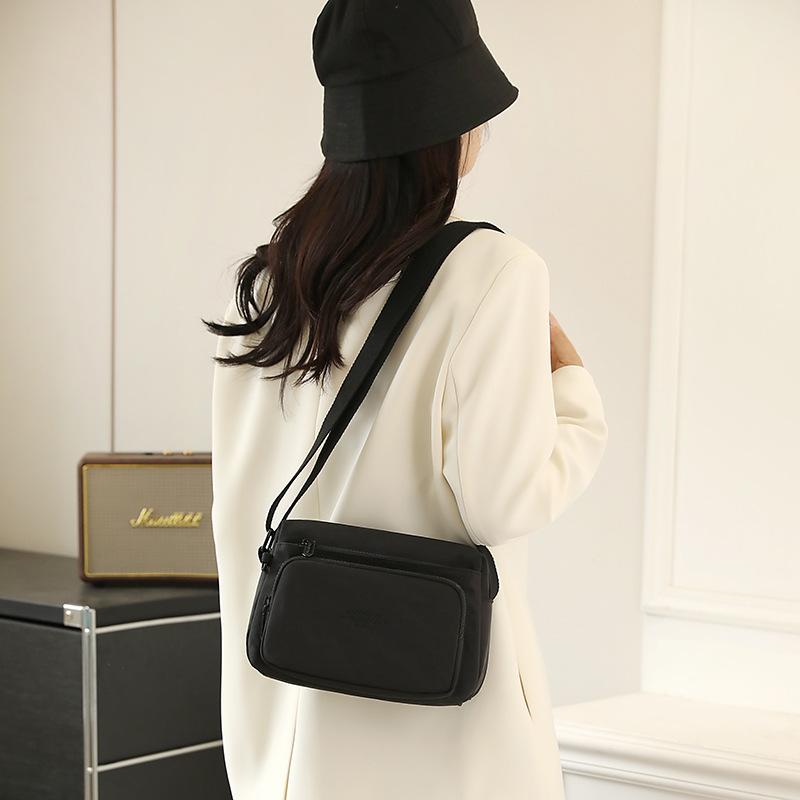 New Women's Versatile Multi-layer Nylon Leisure Commuter Travel Portable Messenger Bag