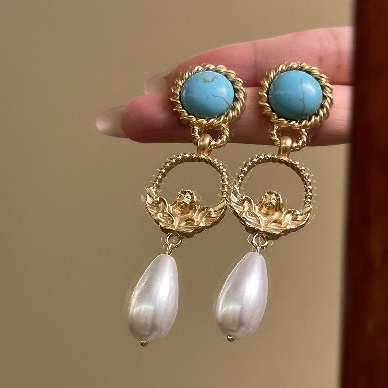 

Жемчужные серьги-подвески в виде капли воды Богемные ретро серьги легкой роскоши Нишевые темпераментные серьги высокого класса женские