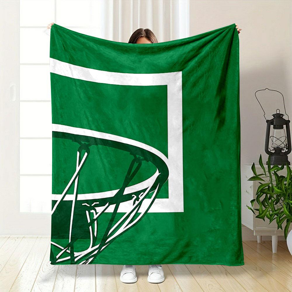 Basketball hoop and net silhouetted against a green background. for all seasons blanket lunch break throw gift