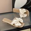 Mode 2025 Neue Schleifen-Slipper Damen Sommerbekleidung Neue Modische Süße Mädchen Flache Sohle Rutschfest Feenhafter Stil Wort Cool Slipper Damen