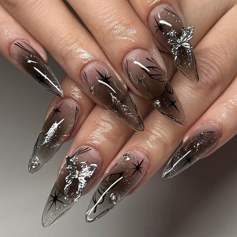 

Black and Nude Silver Bow Press-on Nails with Butterfly Diamond Art - Long, Pointed Tips