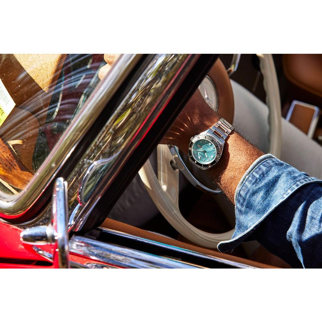 Citizen Automatic Stainless Steel Analog Watch with Light Blue Black and Silver Three Silver Band Men's Dial, Bezel, Hands, Day/Date (Model