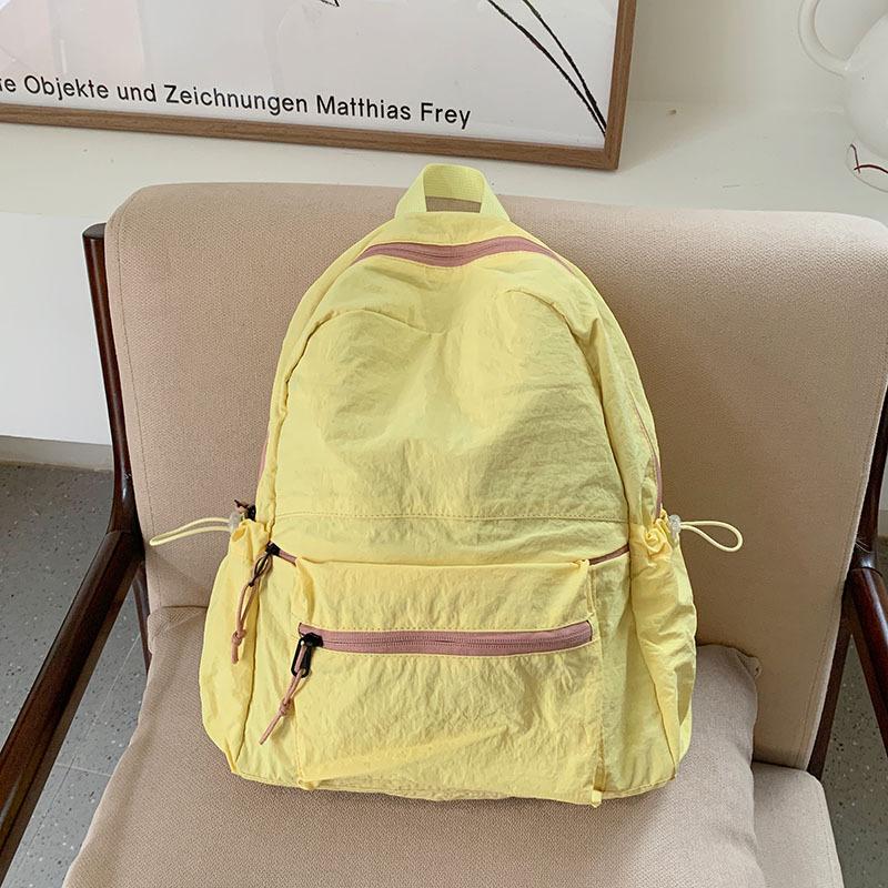 Schoolbag Ultra Light Portable Backpack Commuter Wash Pleated Sense Backpack Leisure Large Capacity Versatile School Bag Women's Travel Bag Tide