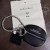 2025 Versatile Lychee Grain Key Pouch: Fashionable Charm Bag & Coin Purse