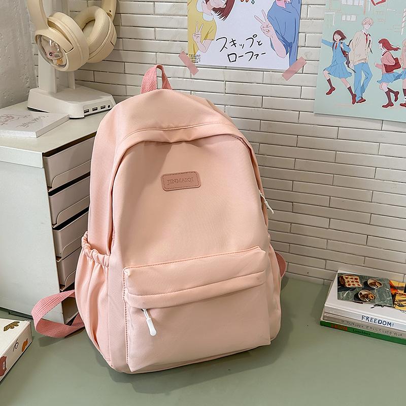 Schoolbag new female students junior high school students high school students large capacity college students backpack wind simple backpack computer