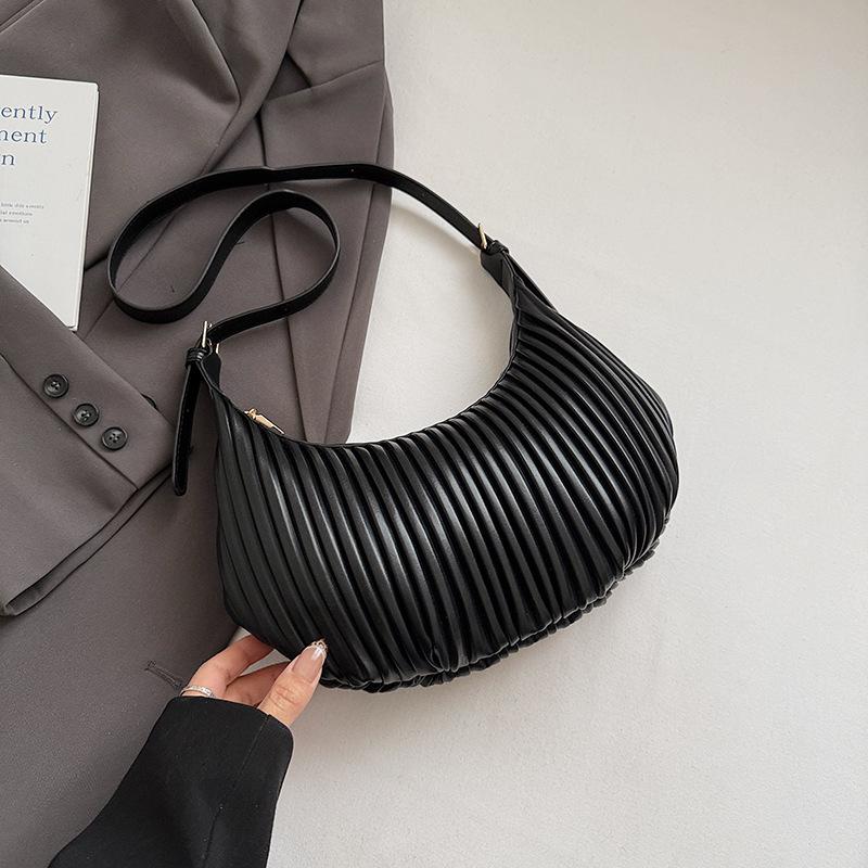 

Korean version of vertical stripe handbag bag 2025 new niche shoulder bag high value fashionable casual foreign style bag women чорний