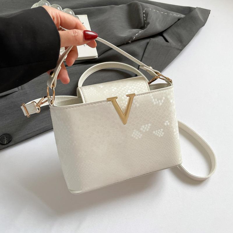 2025 light luxury high-end fashion women's handbag snake pattern versatile shoulder bag simple atmosphere messenger bag