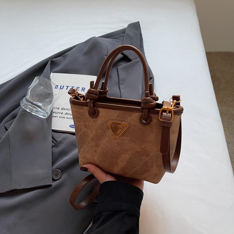 New product hot sale fashionable retro high texture women's hand bucket bag versatile commuter casual messenger bag