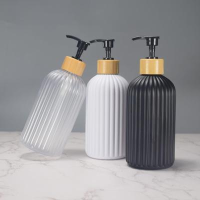 Available: 500ml Black Matte Plastic Shampoo Bottle with Wood Grain Pump, Empty PET Packaging.