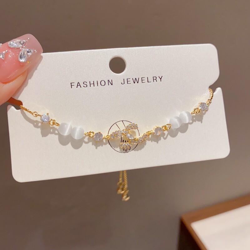 Adjustable Pull-Through Cat Eye Stone Bracelet With Moon Star Motif Gold Plated Copper Women Fashion Jewelry