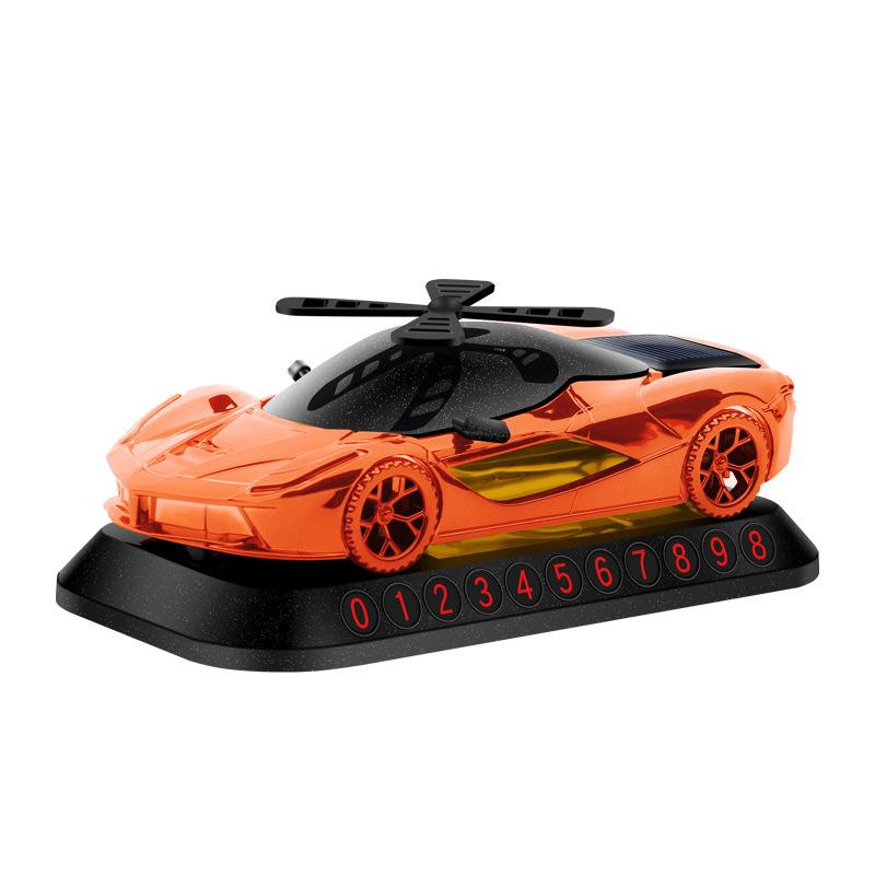 

Solar Sports Car Air Freshener: Light-Activated Rotation Baby-Safe Odor-Removing for Auto помаранчевий