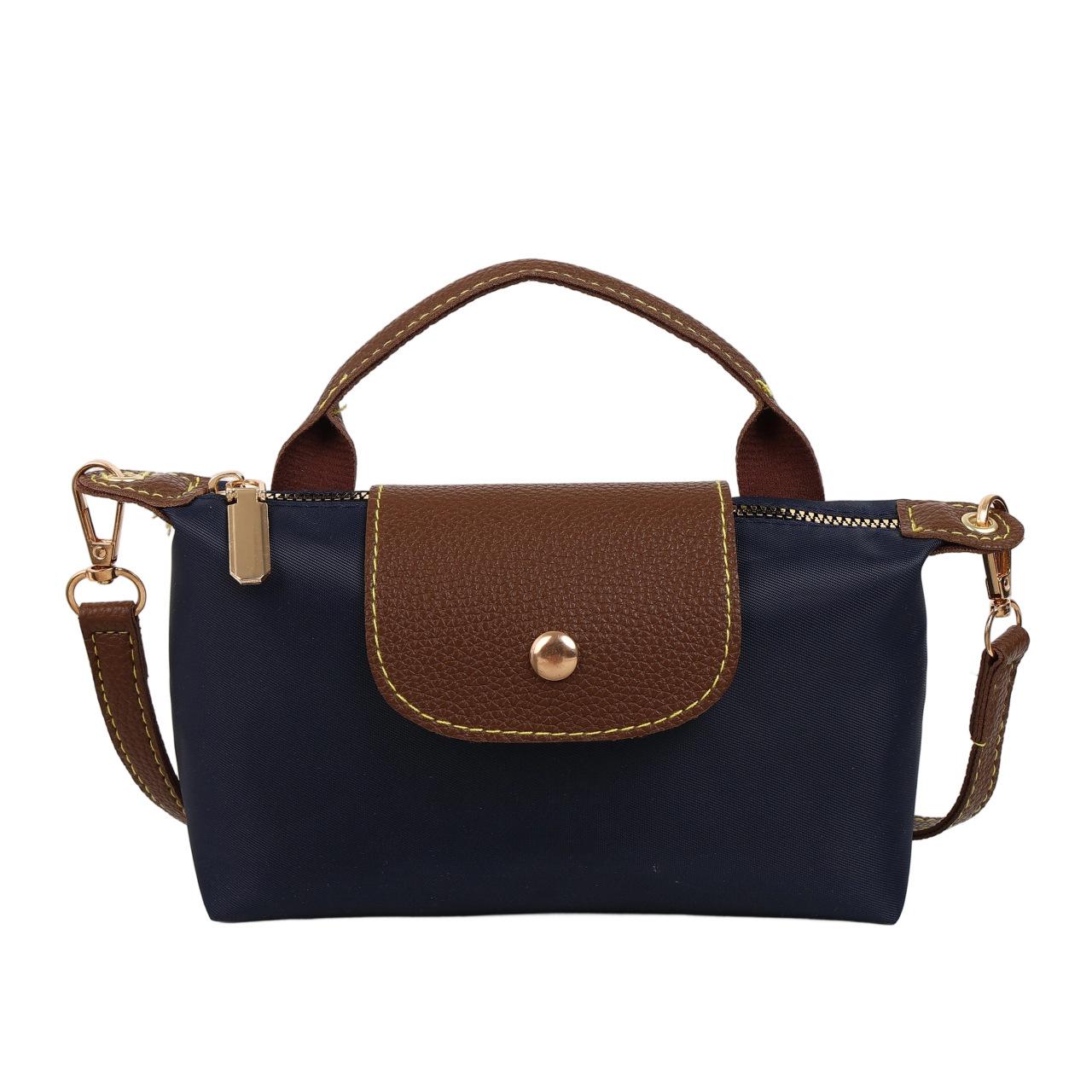 

Bag women 2025 spring and summer new high-end nylon dumpling bag versatile messenger canvas handbag синій