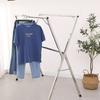 Stainless steel foldable and extendable clothes drying rack for indoor and outdoor use, suitable for futon drying. Also suitable for balconies and ind