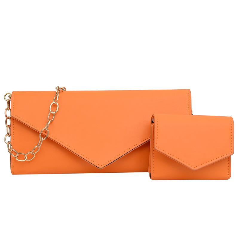 

2024 early autumn new two-piece bag women s personality solid color underarm bag texture chain commuter shoulder messenger bag помаранчевий