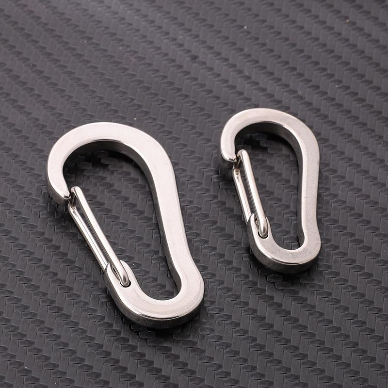 

Stainless Steel Oval Keychain Hook for Luggage & Outdoor Use - Quick Release Spring Buckle Accessory 41x22x4 mm