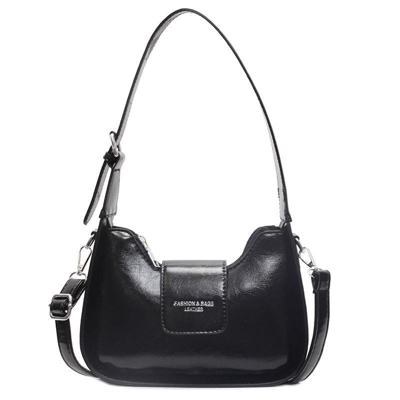 

2025 ранняя весна новая французская нишевая повседневная высококлассная сумка под мышкой универсальная простая однотонная pu сумка-мессенджер женская чёрный